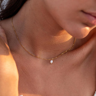 ALCO Isla necklace in 18K gold-plated stainless steel with freshwater pearl, lobster clasp, and 16 inch chain.