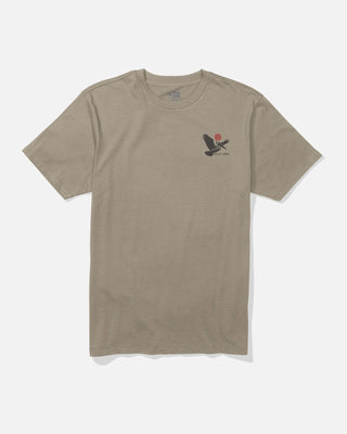 Beige t-shirt with a small graphic on a white background