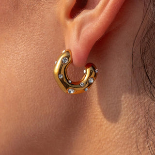 ALCO Sophie hoops in 18K gold-plated stainless steel with cubic zirconia stones and push back closure for elegance.