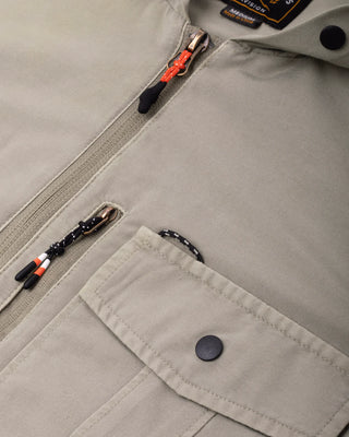 Dark Seas Albright UV long sleeve hooded fishing shirt with moisture-wicking stretch fabric, burnout panels, and zippered pockets.