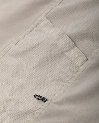 Dark Seas Albright UV long sleeve hooded fishing shirt with moisture-wicking stretch fabric, burnout panels, and zippered pockets.