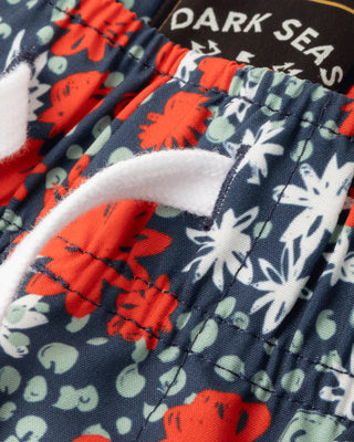 Dark Seas Warwick Short in Navy/Red with elastic waist and volley short fit.