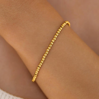 ALCO Seaside Stretch bracelet in 18K gold-plated stainless steel with comfortable stretch design for effortless coastal style.