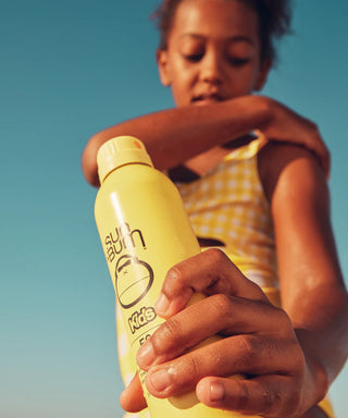 Image of Sun Bum Kids SPF 50 Clear Sunscreen Spray, an easy-to-apply, clear, water-resistant sunscreen offering high protection for young active ones.