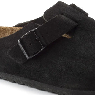 Birkenstock Boston Black suede clogs with soft footbed and adjustable strap.