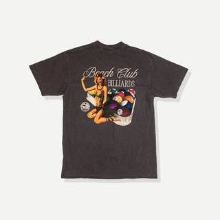 Back view of a model wearing the Duvin Rack Em Tee in washed black with a Beach Club Billiards graphic featuring a retro woman and colorful pool balls