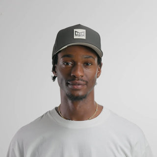 melin Odysea Stacked Hydro Hat in Faded Black — hydrophobic crown panels, water repellant, floatable, and breathable with moisture-wicking lining and hidden besom pocket