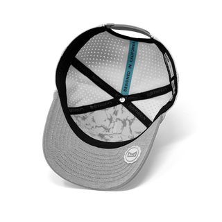 melin Odysea Rope Bulls Icon Hydro Hat in White/Grey with a white crown, grey curved visor and front logo, patterned rope trim, and perforated side panels.