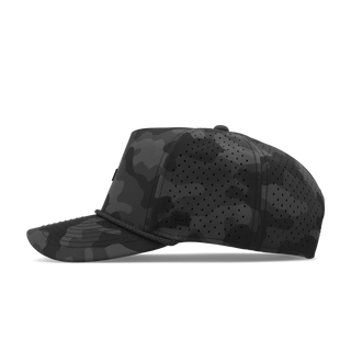 melin Odysea Rope Bulls Icon Hydro Hat in Black Camo with a dark camouflage pattern, curved visor, black rope trim, tonal front logo, and perforated side panels.