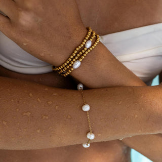 ALCO Rosemary bracelet in 18K gold-plated stainless steel with freshwater pearls, lobster clasp, and 6.5 inch length.