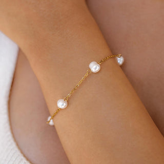 ALCO Rosemary bracelet in 18K gold-plated stainless steel with freshwater pearls, lobster clasp, and 6.5 inch length.