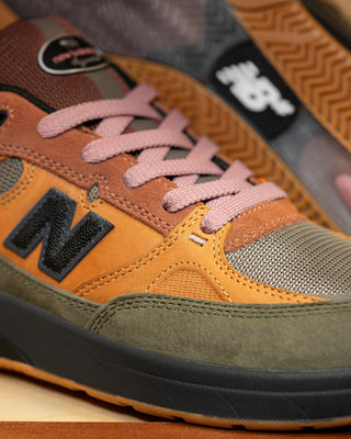  New Balance Numeric 933 Andrew Reynolds Mike Gigliotti in True Brown/Candy Pink with FuelCell foam and ABZORB cushioning.