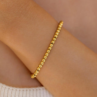 ALCO Seaside Stretch bracelet in 18K gold-plated stainless steel with comfortable stretch design for effortless coastal style.