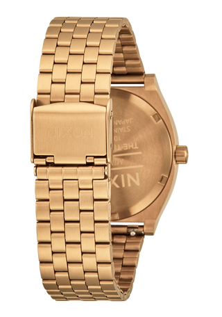 Nixon Time Teller 4th Dimension Gold/Vintage White watch with gold stainless steel bracelet and vintage white dial.