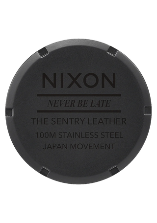 Nixon Sentry Leather Matte Black/Gold watch with black leather strap and gold-accented analog dial.