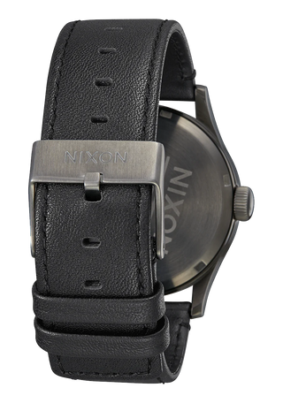 Nixon Sentry Leather Watch in Gunmetal/Black with a detailed face, stainless steel case, and custom leather band.