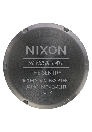 Nixon Sentry Leather Watch in Gunmetal/Black with a detailed face, stainless steel case, and custom leather band.