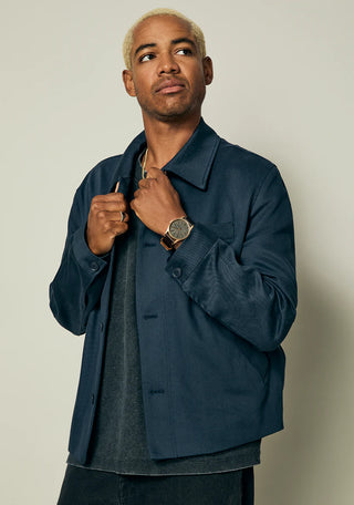 Nixon Sentry Leather Rose Gold/Gunmetal/Brown watch with brown leather strap and gunmetal analog dial.