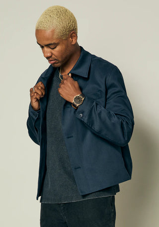 Nixon Sentry Leather Rose Gold/Gunmetal/Brown watch with brown leather strap and gunmetal analog dial.