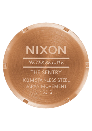 Nixon Sentry Leather Rose Gold/Gunmetal/Brown watch with brown leather strap and gunmetal analog dial.