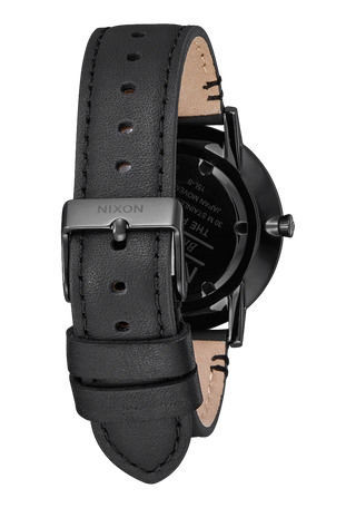Nixon Porter Leather All Black analog watch with black leather strap and minimalist black dial.