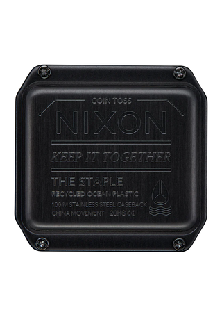 Nixon Staple All Black digital watch with recycled plastic case, high-contrast LCD, and black rubber-blend strap.