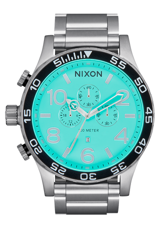 Nixon 51-30 Chrono Watch in Silver-Turquoise with oversized face and stainless steel bracelet.