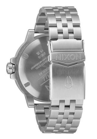 Nixon Stinger 44 Watch in Silver/Black/White with luminous display and stainless steel bracelet.