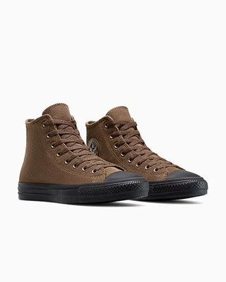 Brown high-top sneakers with black soles on a white background