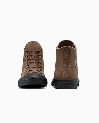 Brown high-top sneakers on a white background