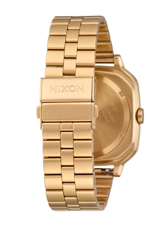 Nixon Fremont 40 Gold/Black analog watch with gold stainless steel bracelet and black dial.