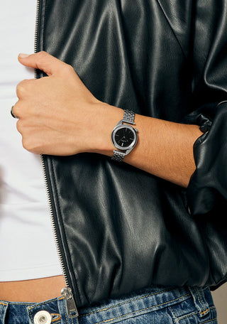 Nixon Eddy All Silver/Black analog watch with stainless steel bracelet and black dial.
