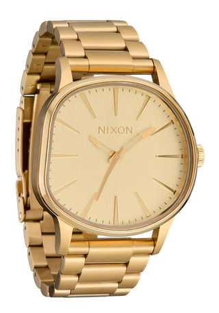 Nixon Sentry Wobble Watch in All Gold — 42mm stainless steel case with unique bent wobble design, Miyota quartz movement, hardened mineral crystal, lume hands, and quick-release bracelet