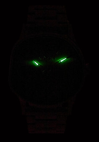 Nixon Sentry Wobble Watch in All Gold — 42mm stainless steel case with unique bent wobble design, Miyota quartz movement, hardened mineral crystal, lume hands, and quick-release bracelet