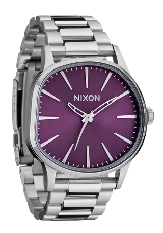 Nixon Sentry Wobble Watch in Silver/Purple Sunray — 42mm stainless steel case with unique bent wobble design, Miyota quartz movement, hardened mineral crystal, lume hands, and quick-release bracelet