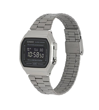 Silver Casio digital watch with metal strap on a white background