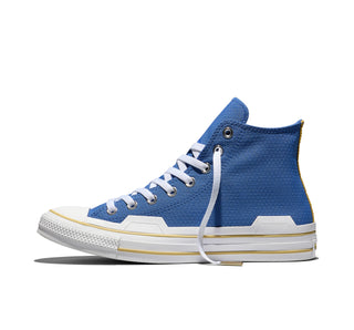 Converse Dragon Ball Z Chuck Taylor All Star HI Vegeta in Delft/High Risk Red/Yellow — textile upper with Scouter charm, Saiyan ankle patch, and cobranded details