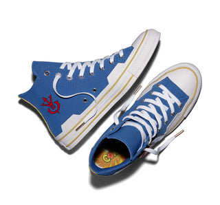 Converse Dragon Ball Z Chuck Taylor All Star HI Vegeta in Delft/High Risk Red/Yellow — textile upper with Scouter charm, Saiyan ankle patch, and cobranded details