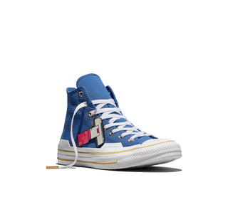 Converse Dragon Ball Z Chuck Taylor All Star HI Vegeta in Delft/High Risk Red/Yellow — textile upper with Scouter charm, Saiyan ankle patch, and cobranded details