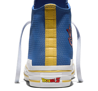 Converse Dragon Ball Z Chuck Taylor All Star HI Vegeta in Delft/High Risk Red/Yellow — textile upper with Scouter charm, Saiyan ankle patch, and cobranded details