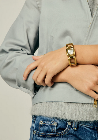 Nixon Sisi Watch in All Gold/Silver — 24mm stainless steel case with linked bracelet, tool-free extra link adjustment, Miyota quartz movement, and 100-meter water resistance