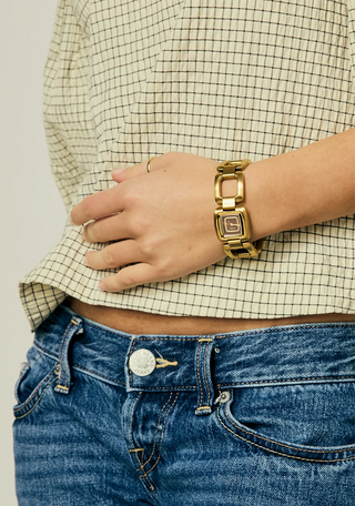 Nixon Sisi Watch in All Gold/Cognac — 24mm stainless steel case with linked bracelet, tool-free extra link adjustment, Miyota quartz movement, and 100-meter water resistance