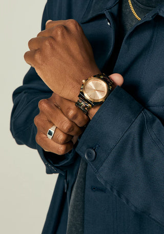 Nixon Time Teller Acetate Rose Gold/Pink watch with handcrafted acetate bracelet and rose gold analog dial.