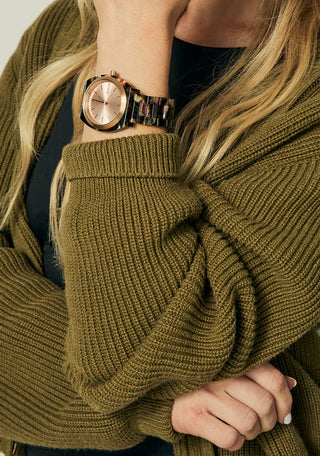 Nixon Time Teller Acetate Rose Gold/Pink watch with handcrafted acetate bracelet and rose gold analog dial.