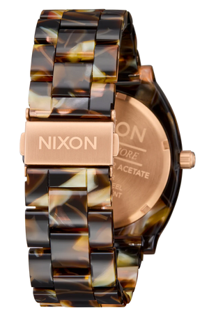 Nixon Time Teller Acetate Rose Gold/Pink watch with handcrafted acetate bracelet and rose gold analog dial.