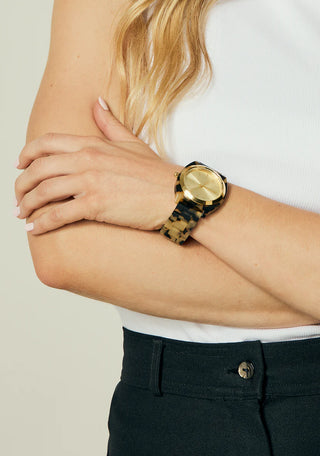 Nixon Time Teller Acetate Cream Tortoise watch with handcrafted acetate bracelet and minimalist analog dial.
