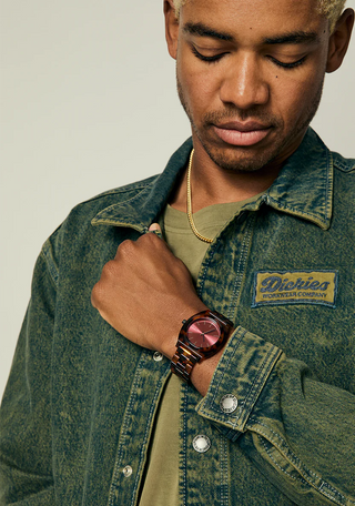 Nixon Time Teller Acetate Tortoise/Oxblood watch with handcrafted acetate bracelet and deep oxblood analog dial.