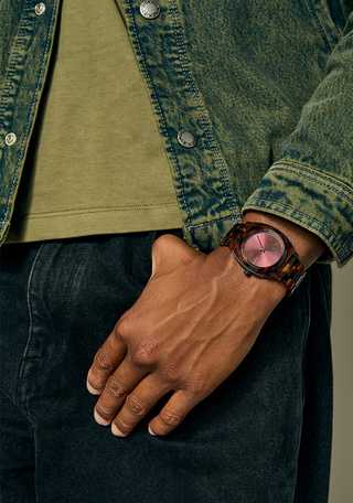 Nixon Time Teller Acetate Tortoise/Oxblood watch with handcrafted acetate bracelet and deep oxblood analog dial.