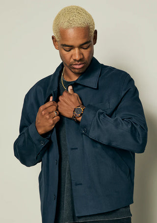 Nixon Time Teller Acetate Tortoise watch with handcrafted acetate bracelet and minimalist analog dial.