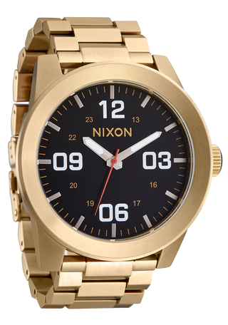 Nixon Corporal Stainless Steel watch in All Gold with a black dial, raised bezel, and faceted bracelet.